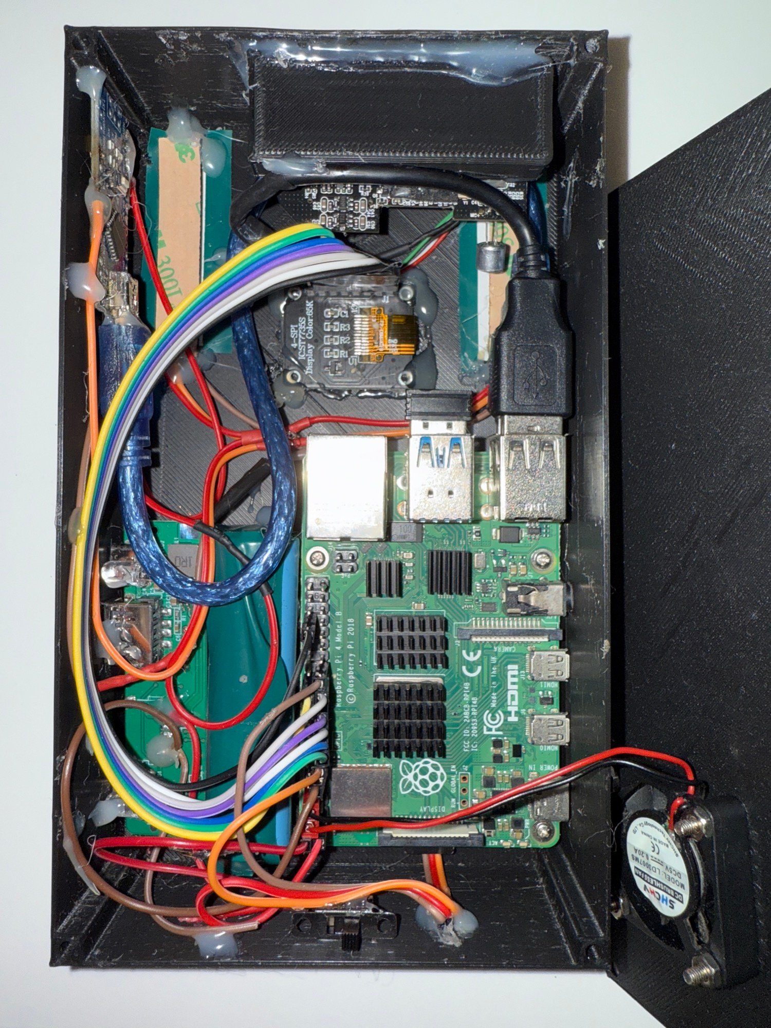 Inside VisionBox &mdash; Raspberry Pi 4, SPI display, WS2812 LED strips, fan and battery