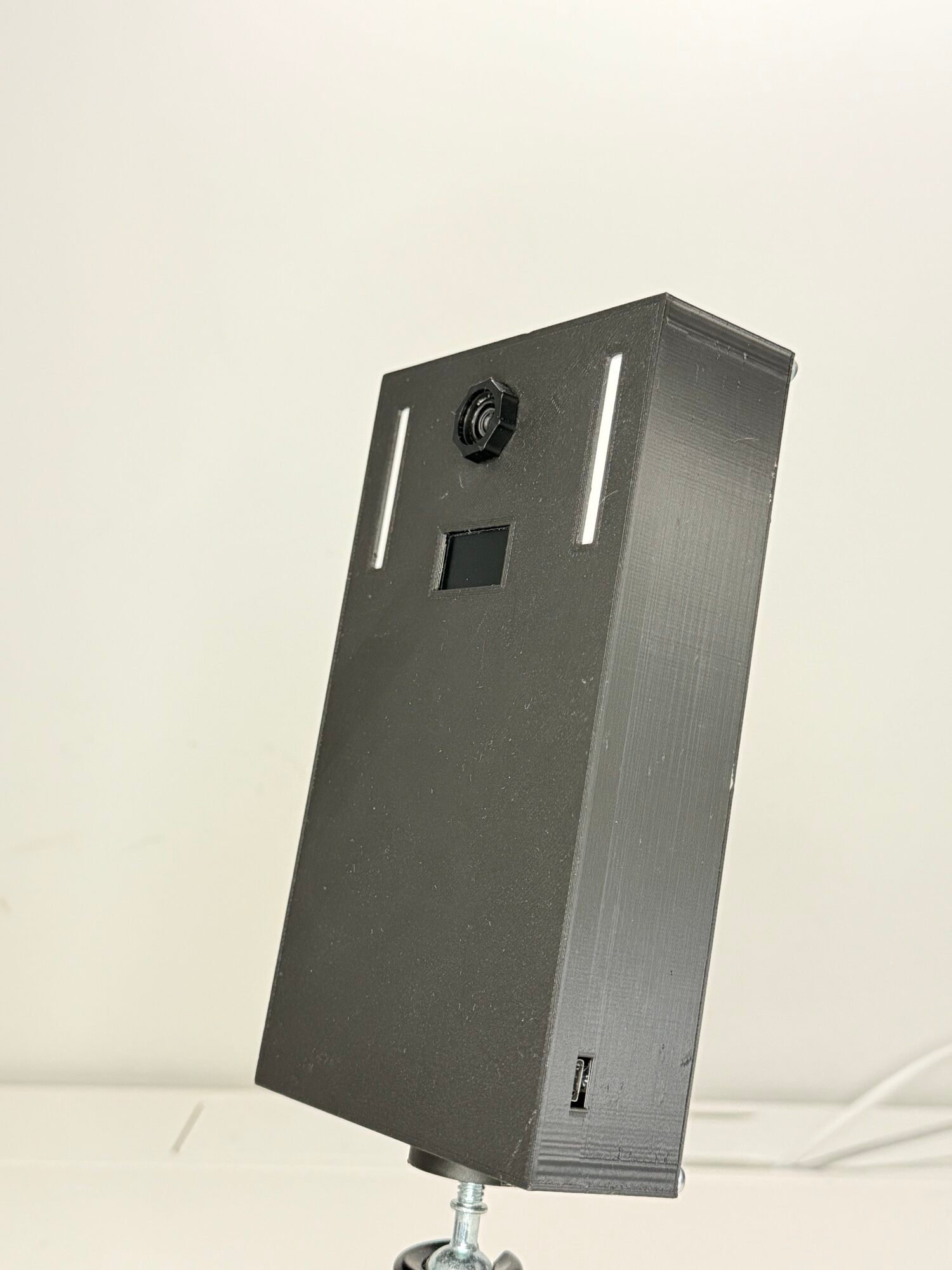 VisionBox side &mdash; slim 3D-printed enclosure with USB-C